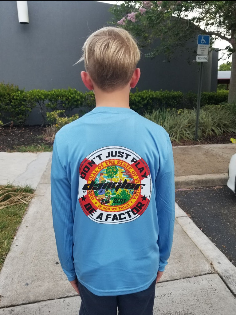 BLUE PERFORMANCE SHIRT/ DON'T JUST PLAY BE A FACTOR FLORIDA FLAG